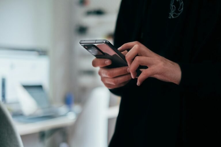 Smartphone being used for mobile account login